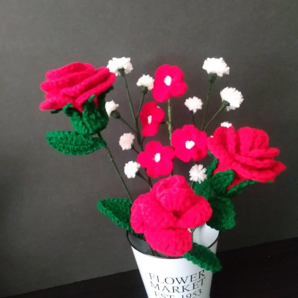 Handmade crochet bouquet of red roses,
